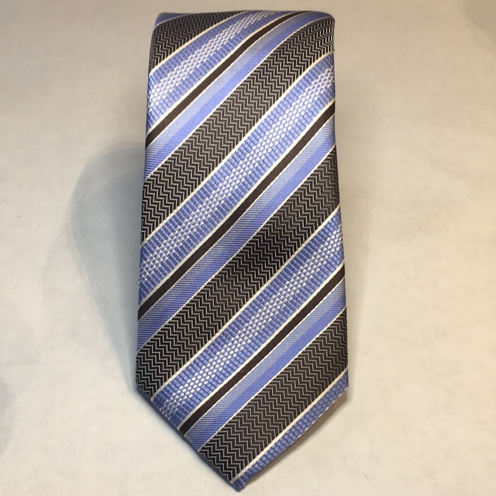 Black Brown 1826. Light blue with brown diagonal stripe tie. Like new. 100% silk